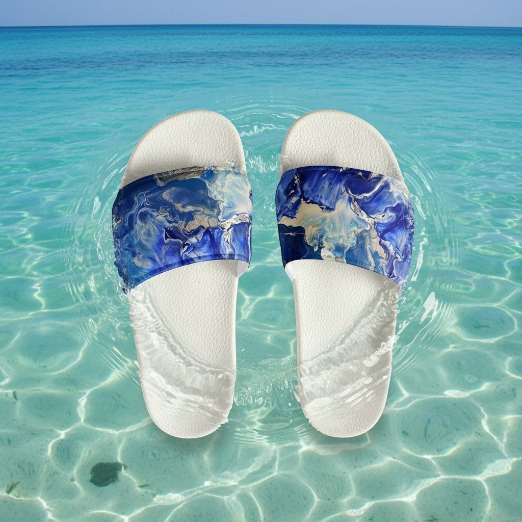 My Store women's blue abstract art slides sandals with white contoured footbed and faux leather upper.